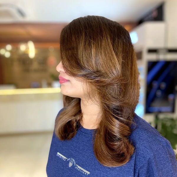 Warm Shades and Sunkissed Highlights -a woman in a side view