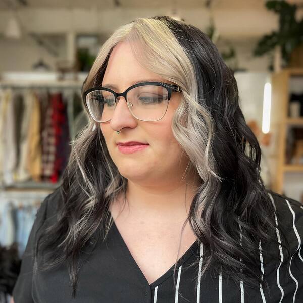 Wavy Chunky Blonde Style - a woman wearing an eyeglasses