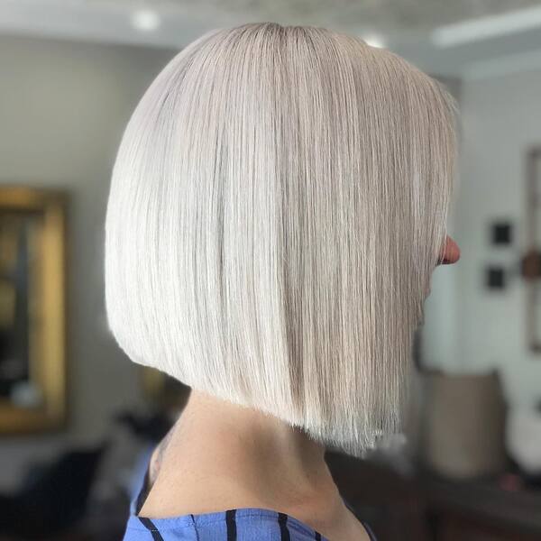 White Blonde in Concave Style  - a woman in a side view
