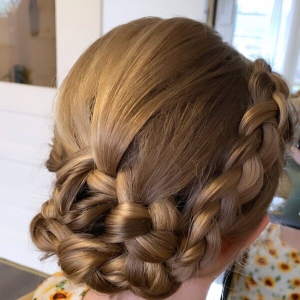 Wrapped Braid- A girl wearing floral blouse