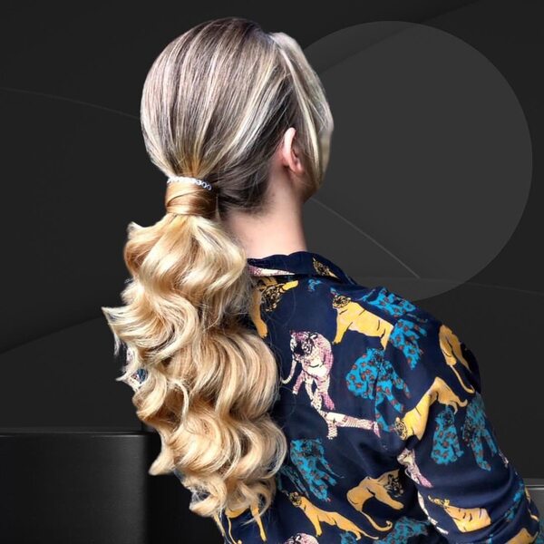 Blonde Wavy Ponytail with Bangs - a woman wearing printed polo