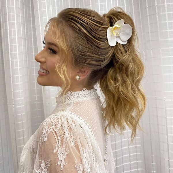 Bridal Ponytail and Bangs - a woman wearing white lacey top