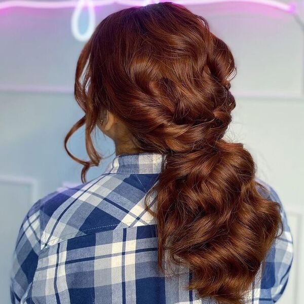 Bronze Pony Updo with Fringe - a woman wearing checkered polo