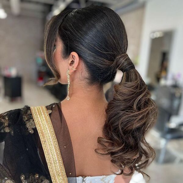 Elegant Ponytail and Side Bangs - a woman wearing gown with dupatta