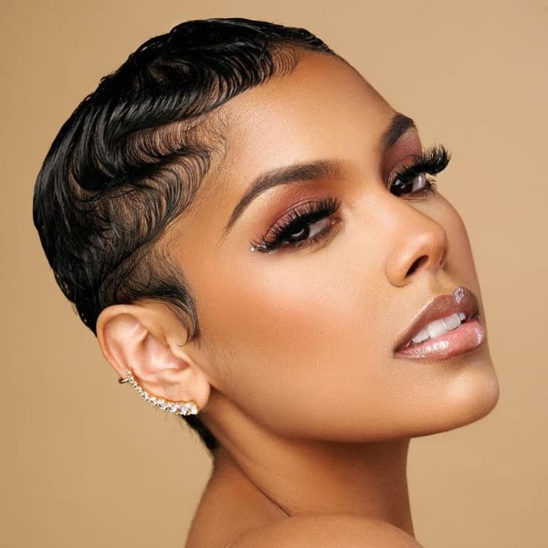 Fine Finger Wave Hairstyle - a woman wearing full glam make up