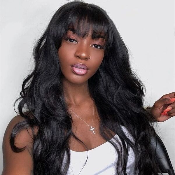 Jet Black Wispy Bangs Wavy Hair - a woman wearing white tank top