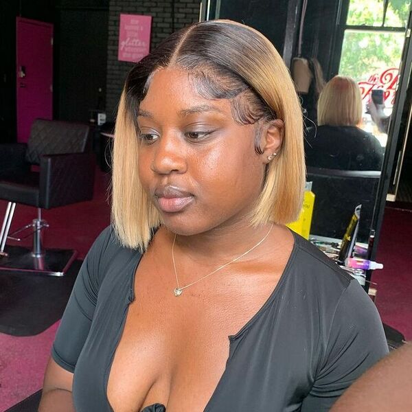 Mid Parted Bob with Frontal Installed - a woman wearing black sexy top