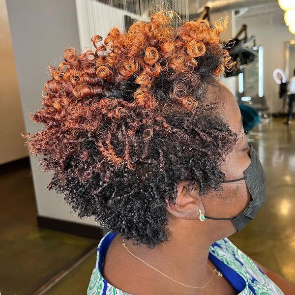 Orangey Tips Coiled Pixie - a woman wearing printed top with mask