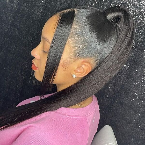 Sleek Bangs and Ponytail - a woman wearing pink shirt