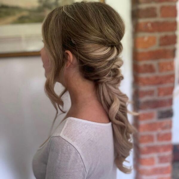 Textured Boho Ponytails with Bangs - a woman wearing white long sleeves