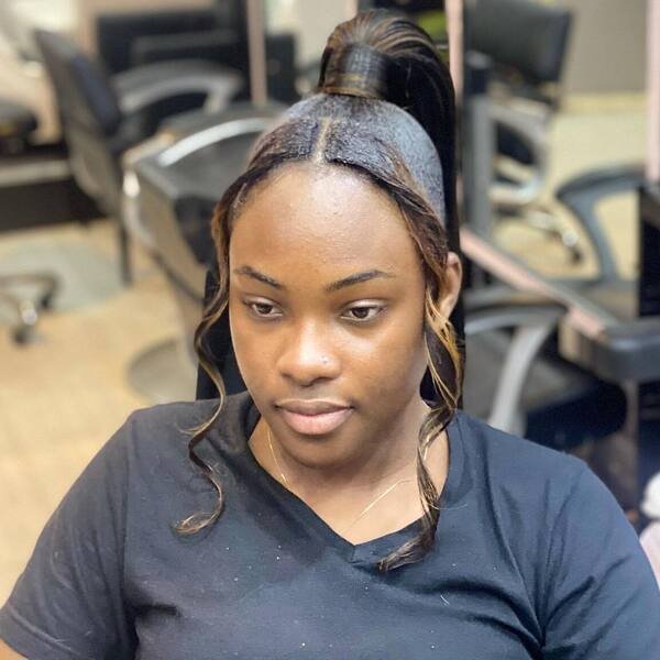 Wispy Ponytail with Curled Frontal - a woman wearing plain black shirt