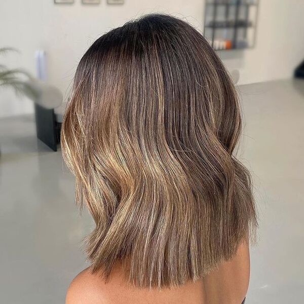 Blended Highlights Long Lob Hair - a woman wearing tube top