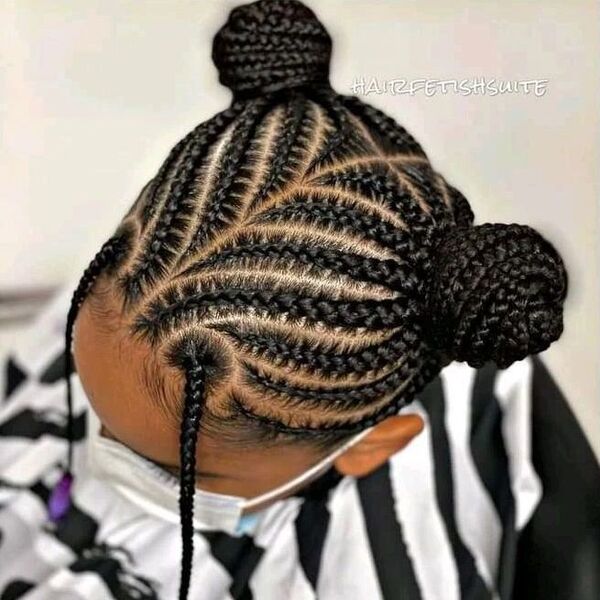 Braided Top Knot and Bangs - a girl is wearing stripe cape