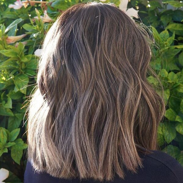 Choppy Long Bob Cool Tone - a woman wearing black shirt