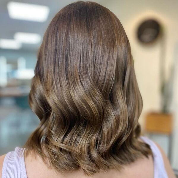 Coffee Brown Long Bob Ombre - a woman wearing purple top