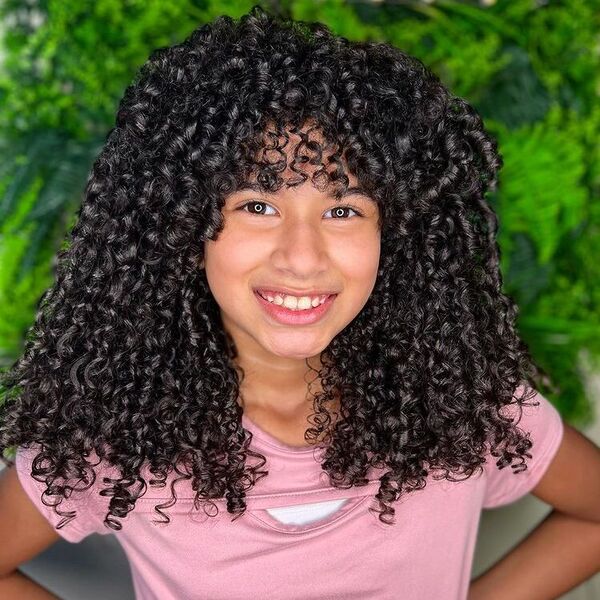 Coiled Long Bob with Fringes - a girl is wearing pink top