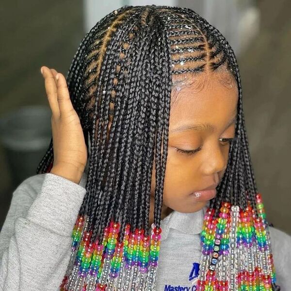 Colorful Beads on Tiny Fulani Braids - a girl is wearing gray jacket