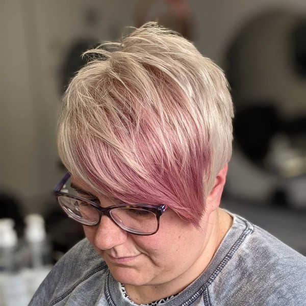 A woman wearing acid wash shirt