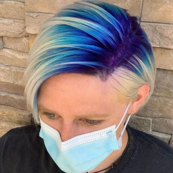 A woman wearing surgical mask in black shirt