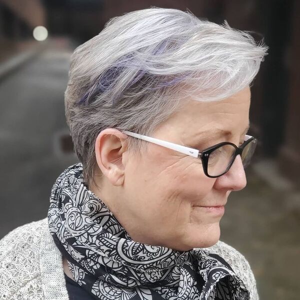 A woman wearing black white scarf