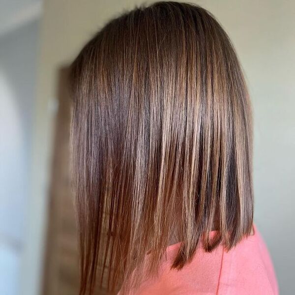 Fine Hair on Long Bob - a woman wearing pink shirt