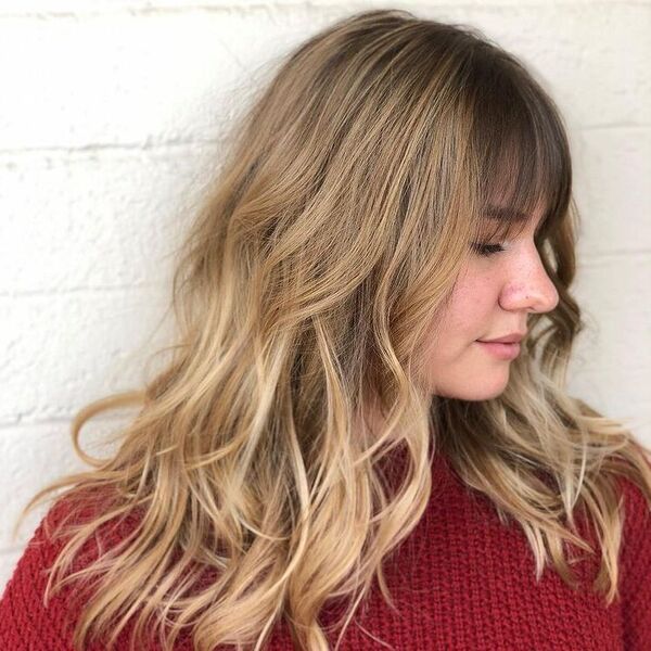 Gorgeous Balayage on Shag Fringe - a woman wearing red crochet sweater