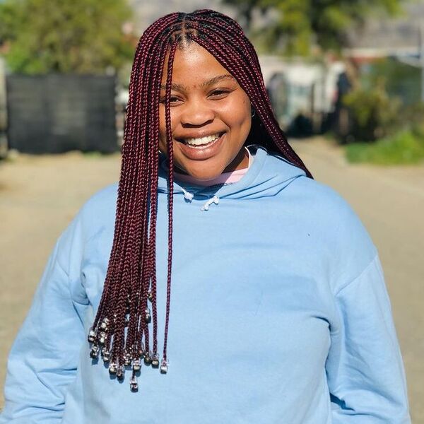 A woman wearing blue hooded jacket