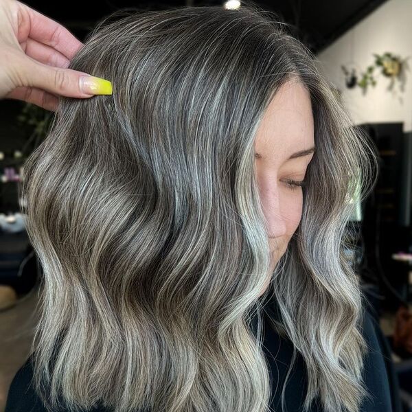 Grey Blending Long Bob - a woman wearing black shirt