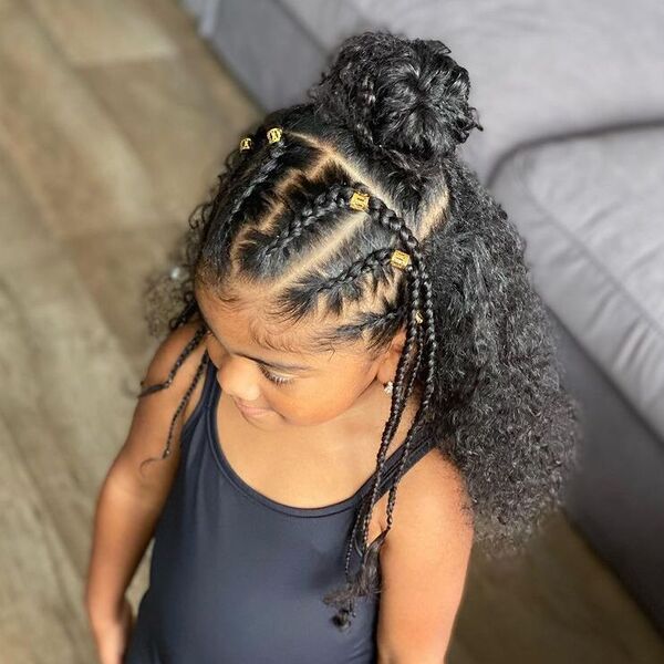 Half Up Braids and Bun - a woman wearing black tank top