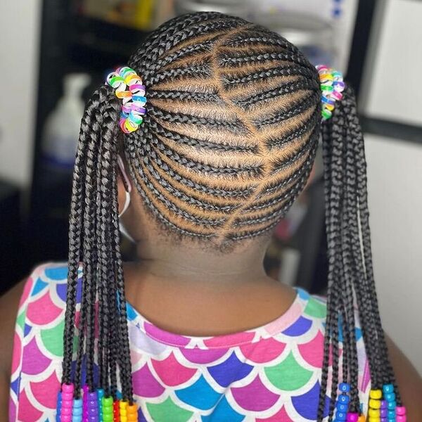 Lemonade Braids Two Ponytails - a girl is wearing colorful sleeveless top