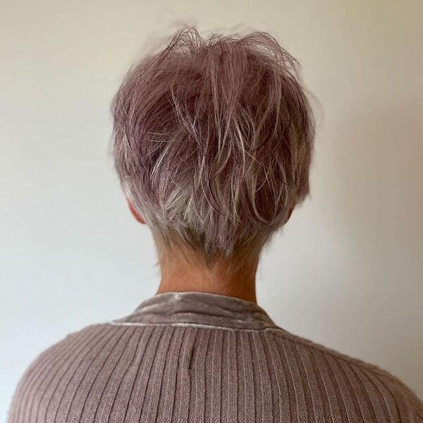 A woman wearing knitted brown top