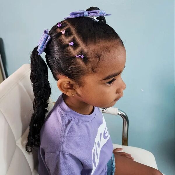 Ponytails with Box Rubber Braids - a girl is wearing purple shirt