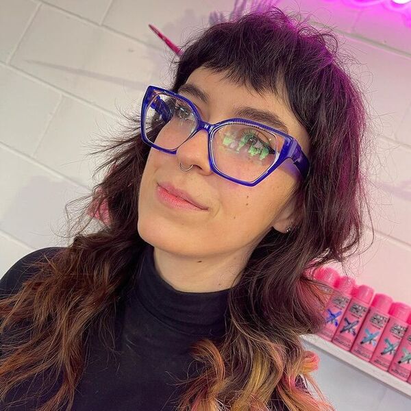 Razor Baby Fringe on Long Hair - a woman wearing turtle neck and glasses