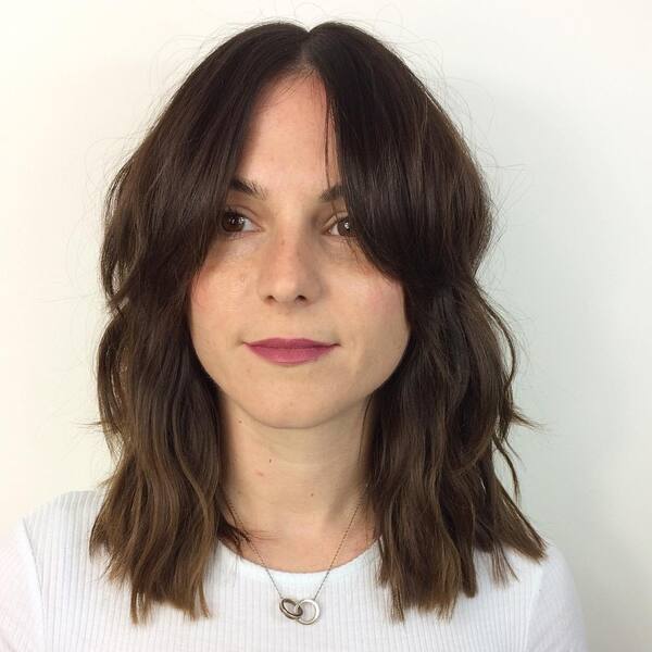 Shag Curtain Fringe Long Bob - a woman wearing white shirt