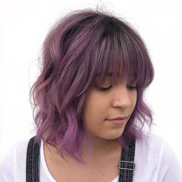 Shag Purple Bob with Fringe - a woman wearing white inner and jumper