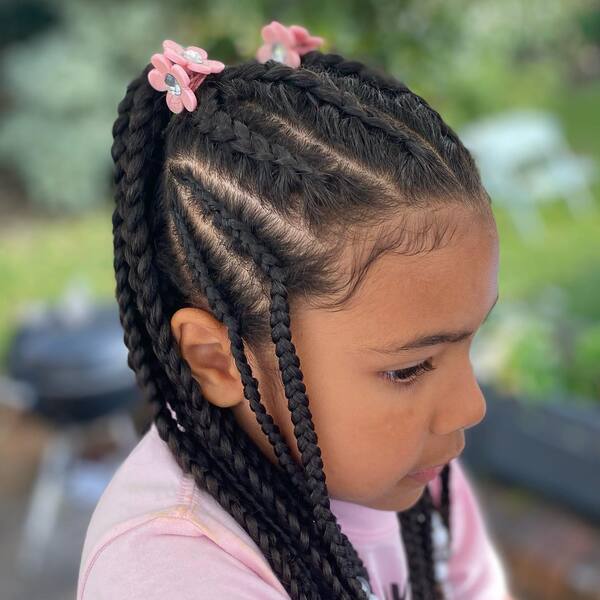 Summer Braids Pony - a woman wearing pink shirt