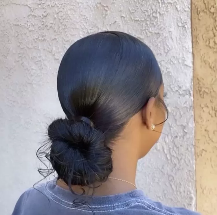 31. Low Bun With Weave (quick weave hairstyles)