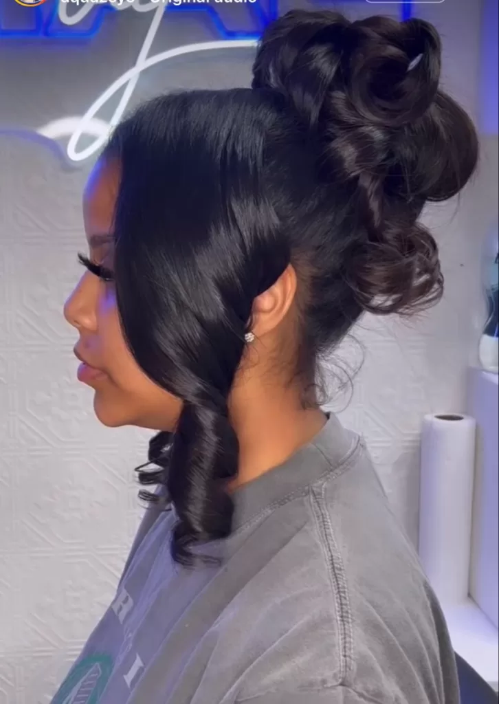 39. Rolled Weave Hair in Bun (quick weave hairstyles)