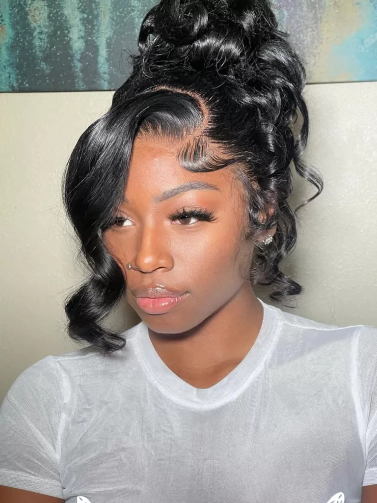40. Wavy Tendrils And Bun Weave Hairstyle (quick weave hairstyles)
