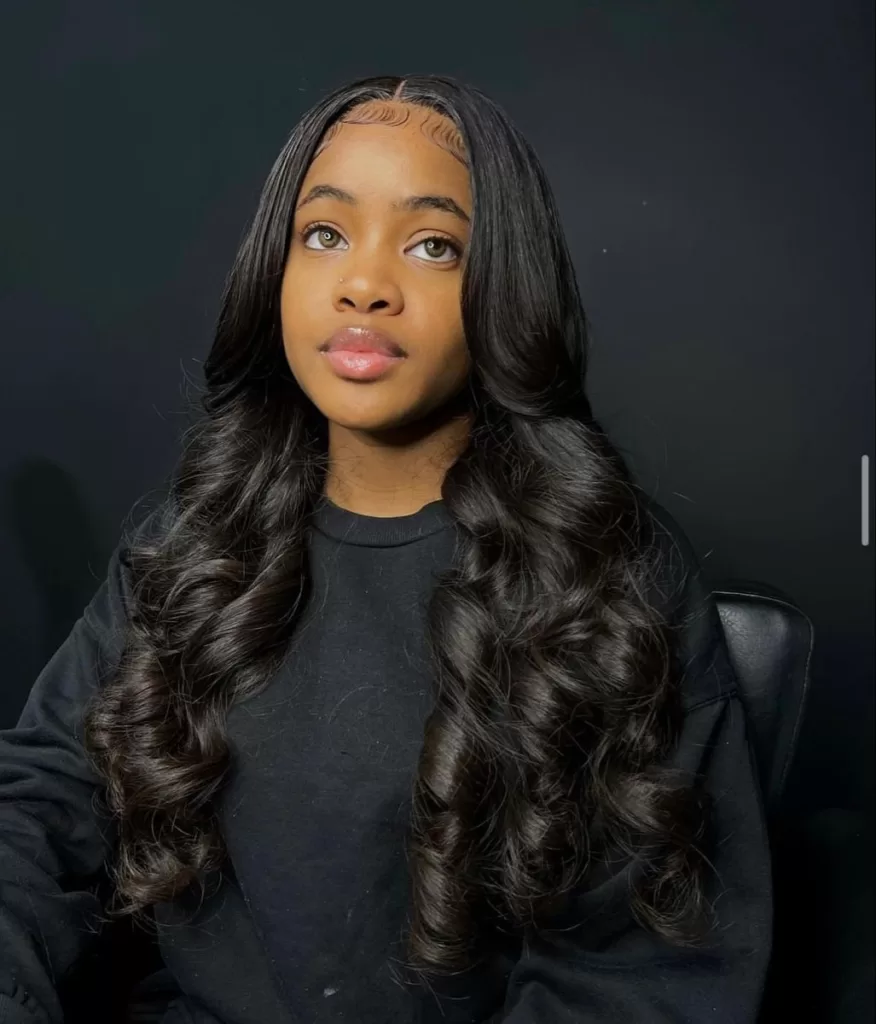 47. Loosely Curled Weave Hairstyle (quick weave hairstyles)
